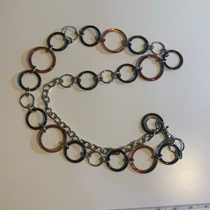 Plastic rings and metal belt